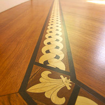The close up of the Maple Merbau and Wenge decorative inlaid border.